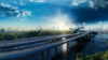A futuristic eVTOL (electric Vertical Takeoff and Landing) aircraft flying over an elevated highway above a river, with a verdant landscape and a city skyline on the horizon, bathed in the warm glow of the rising sun.