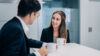 FEV Consulting, businessman and businesswoman brainstorming on a glass board, Career