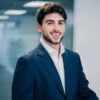 FEV Consulting, businessman standing confidently and smiling, Career