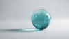 KI generated globe as a teal colored glas marble